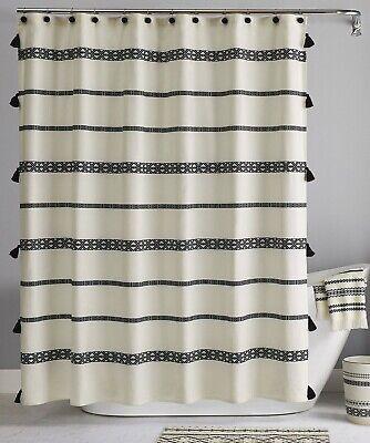 Fringed ​shower curtains that elevate the design of your boho bathroom