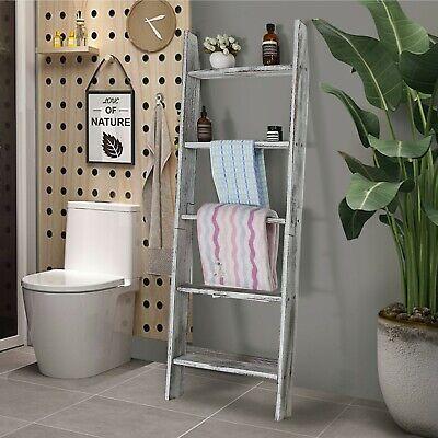 Create a focal point with a vintage wooden ladder in your bathroom