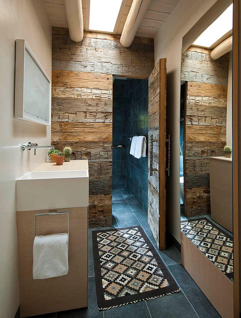 Utilize reclaimed wood accents to warm up your eclectic bathroom environment