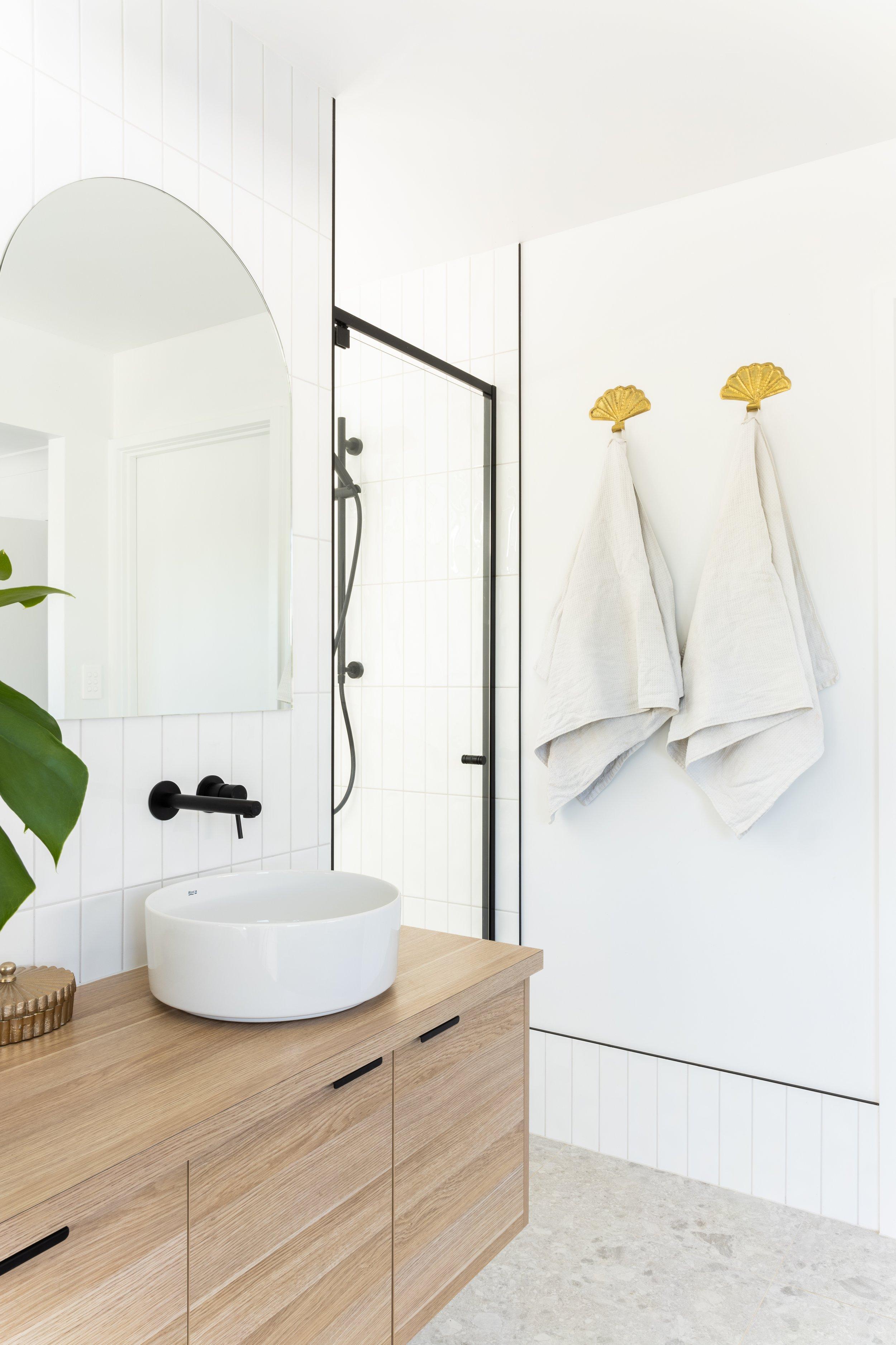 Design an open layout ​to enhance your wooden bathroom’s space