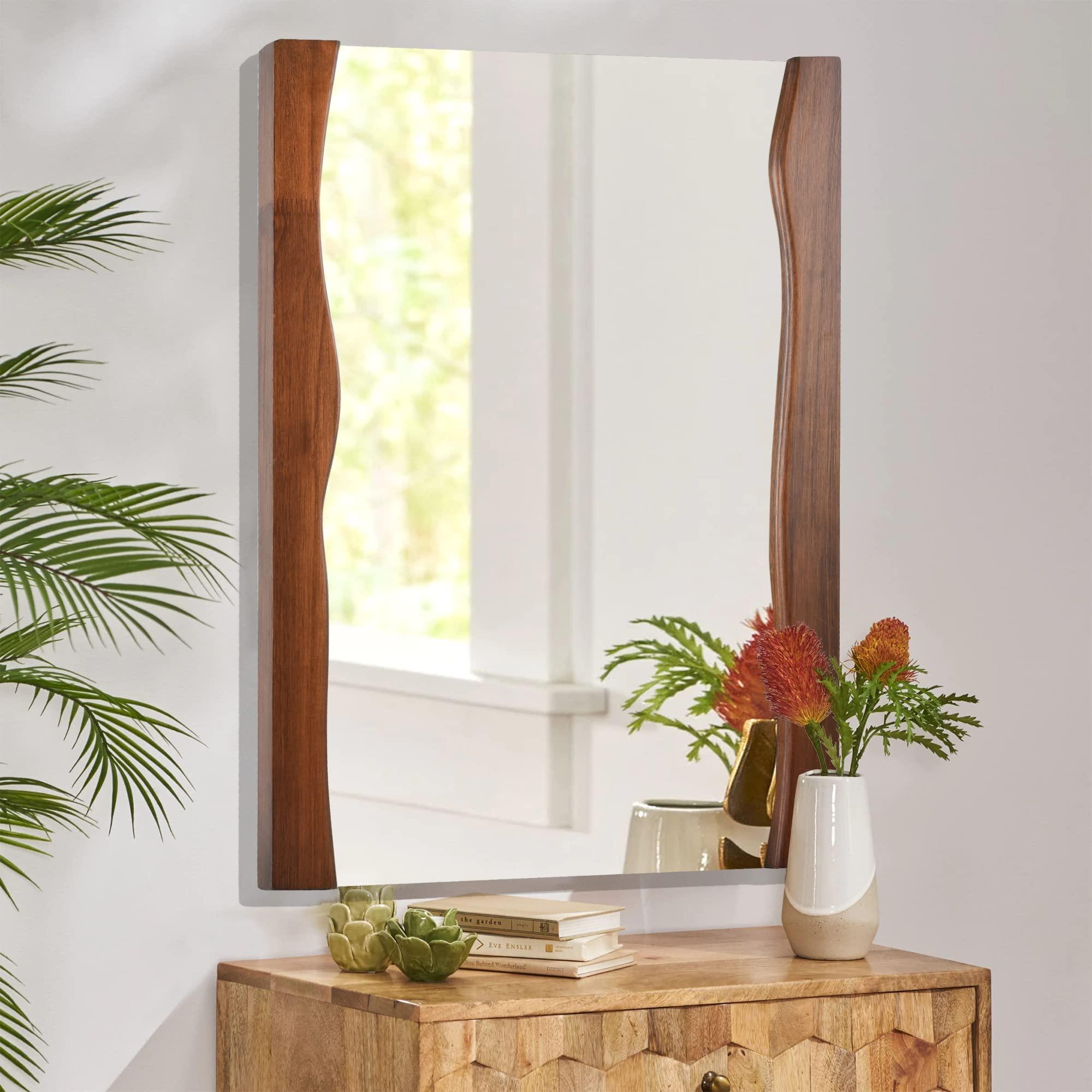 Incorporate wooden bathroom mirrors for a cohesive look