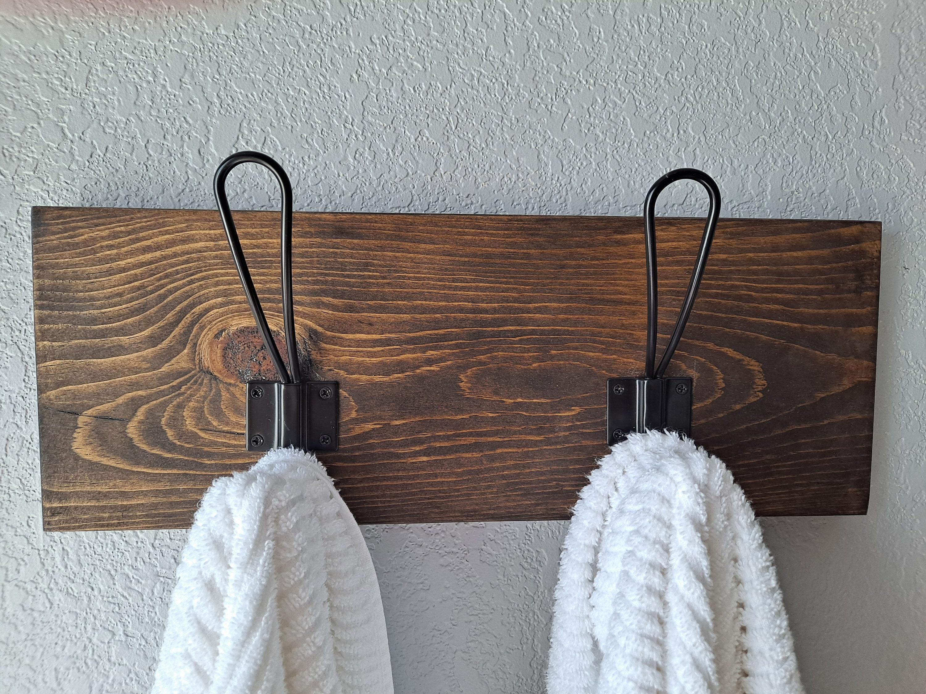 Hang wooden bathroom hooks ​for easy organization