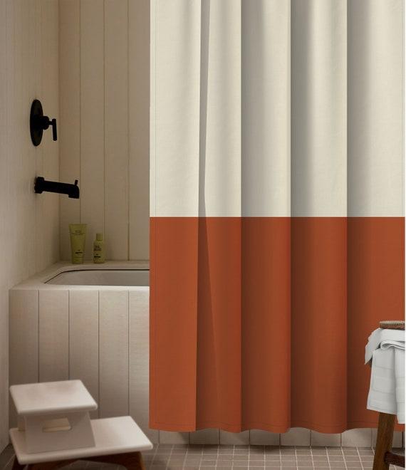 Incorporate a bold shower curtain with eye-catching prints in your eclectic bathroom