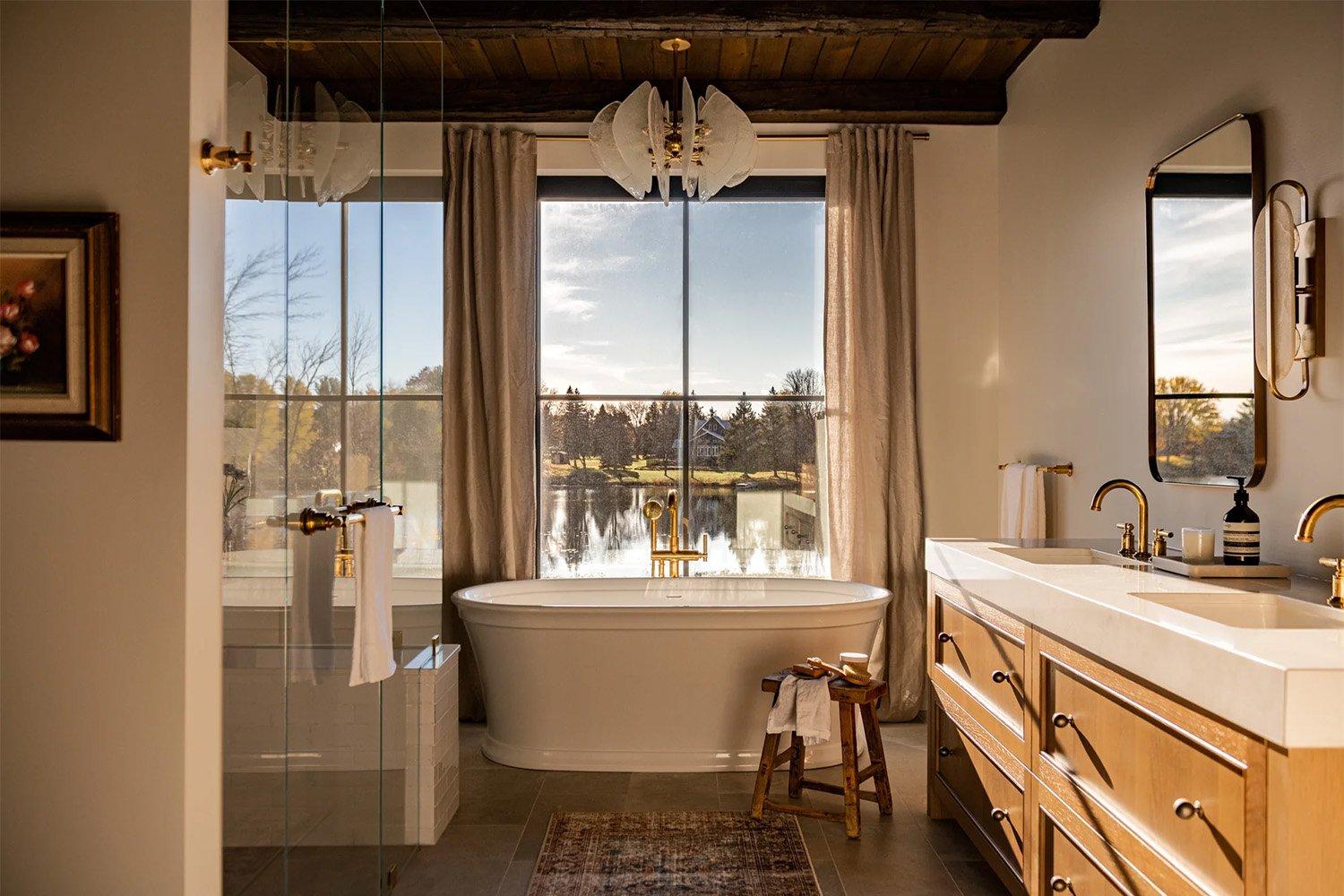 Select earthy tones ​to harmonize with your wooden bathroom’s aesthetic