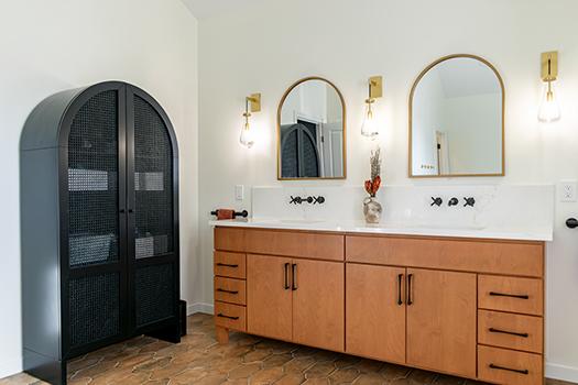 Use ambient lighting to highlight wooden bathroom features