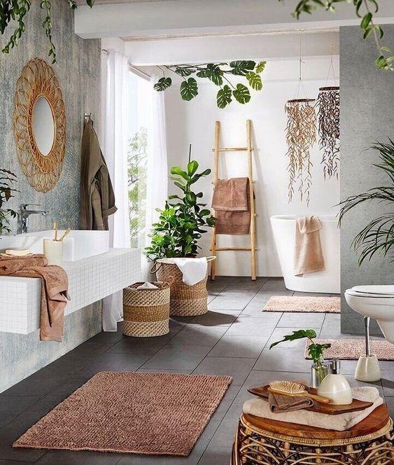 A freestanding tub becomes an inviting centerpiece in your boho bathroom