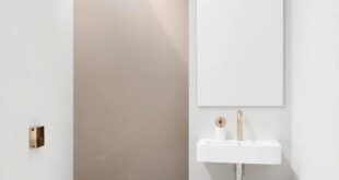 Elevate Your Space: Stylish Bathroom Wall Designs Featuring Metallic Accents