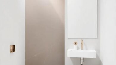 Elevate Your Space: Stylish Bathroom Wall Designs Featuring Metallic Accents