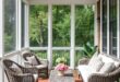 Transform Your Outdoors: Cozy Screened Porches Enhanced by Wicker Elegance