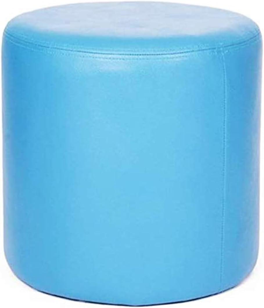 15 Stylish Ottomans & Poufs for Comfy, Chic Living Spaces