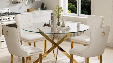 Our Take on the 5-Piece Golden Luxury Round Glass Dining Set