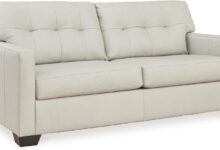 Our Honest Take on the Ashley Belziani White Tufted Leather Sofa