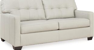 Our Honest Take on the Ashley Belziani White Tufted Leather Sofa