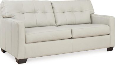 Our Honest Take on the Ashley Belziani White Tufted Leather Sofa