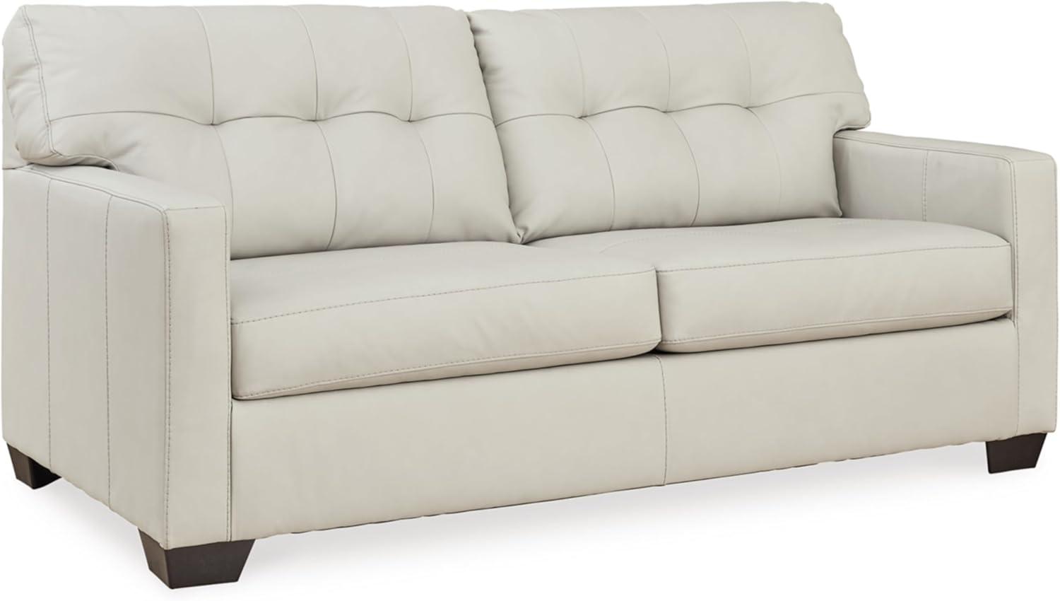 Our Honest Take on the Ashley Belziani White Tufted Leather Sofa