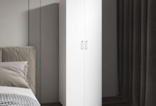 How Our Slim White Armoire Transformed Our Small Bedroom Storage