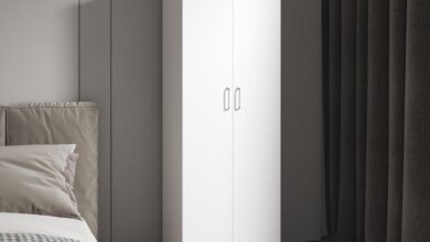 How Our Slim White Armoire Transformed Our Small Bedroom Storage