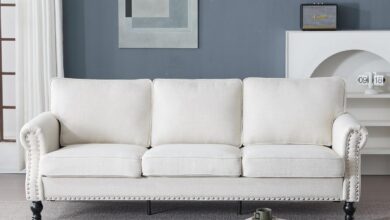 Our Take on the Nailhead Trim Faux Leather Sofa for Living Rooms