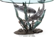 Discovering Elegance: The Dolphin Duet Glass Top Coffee Table