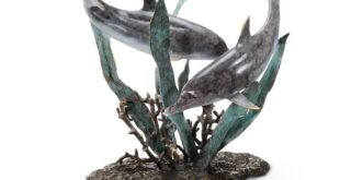 Discovering Elegance: The Dolphin Duet Glass Top Coffee Table