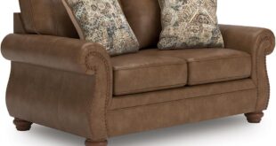 Relaxing In Style Exploring The Shadsburne Rustic Faux Leather Loveseat
