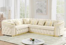 A Plush Velvet Chesterfield Sofa With Striking Gold Accents