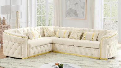 A Plush Velvet Chesterfield Sofa With Striking Gold Accents