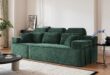 Finding Cozy Moments Together On A Plush Green Corduroy Sofa