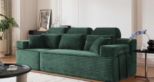 Finding Cozy Moments Together On A Plush Green Corduroy Sofa