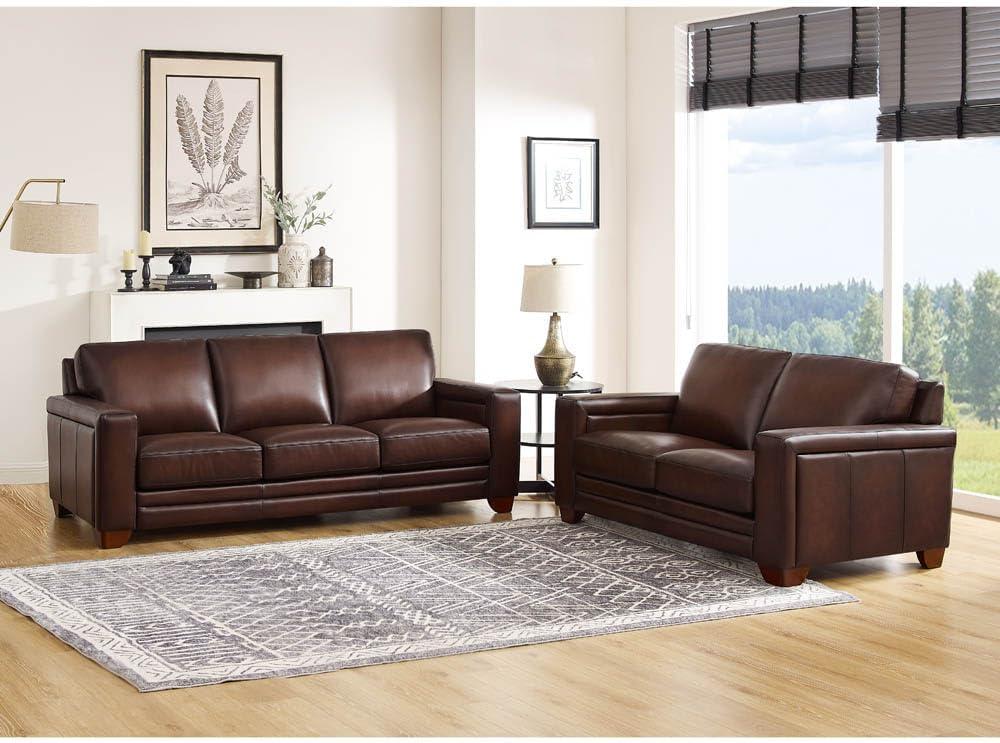 We Sink Into Hydeline's caramel Leather Sofa & Loveseat