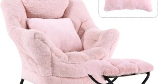 Afternoon Sun Pooled Over A Pink Lazy Chair And Ottoman That Invites Reading