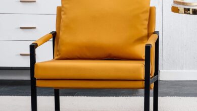 Homfii Faux Leather Armchair Anchoring A Cozy Reading Corner