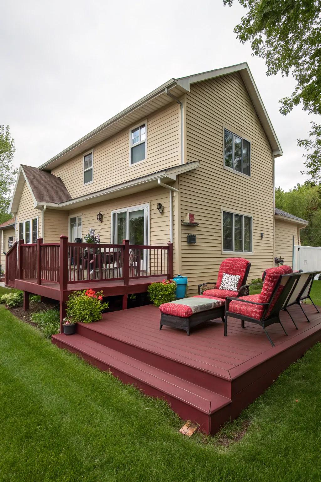 A burgundy deck adding vibrant energy to a beige home.