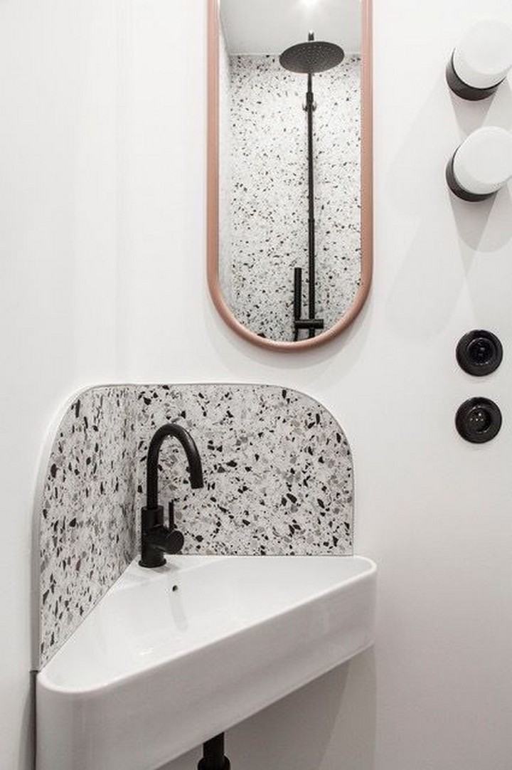 Corner sink design in compact powder room