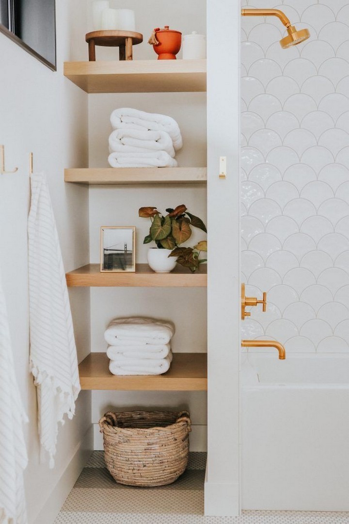 Built-in niches in powder room wall