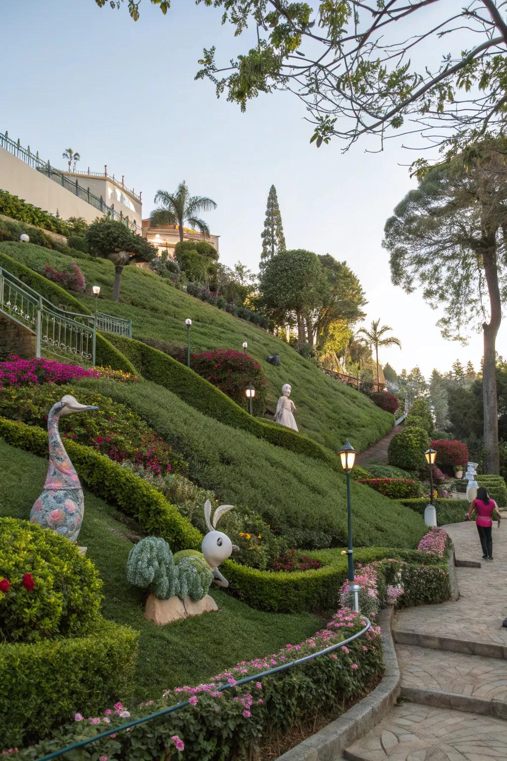 Sculptures add a touch of art and intrigue to garden slopes.