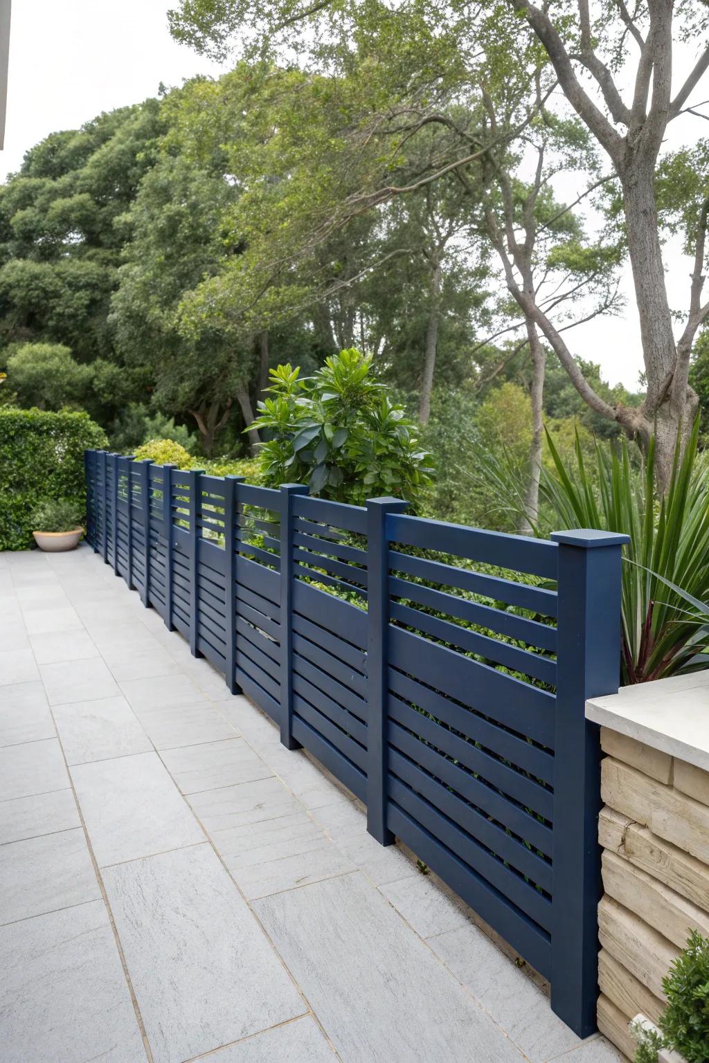 Contrasting colors can make your terrace fence a standout feature.
