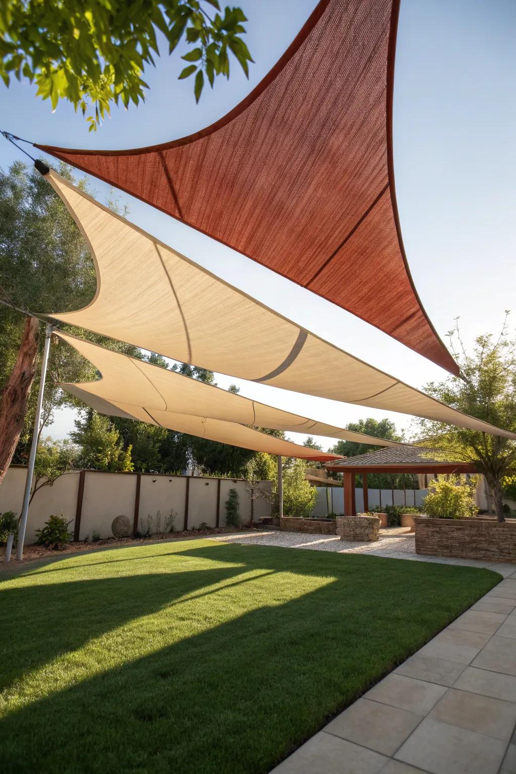 Create interest by overlapping shade sails.