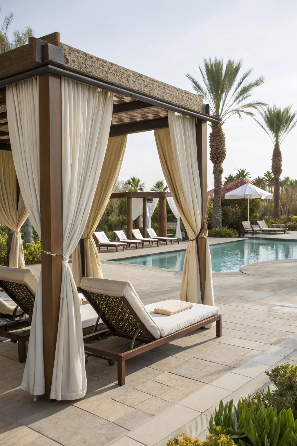 Cabanas provide shade and luxury by the pool.
