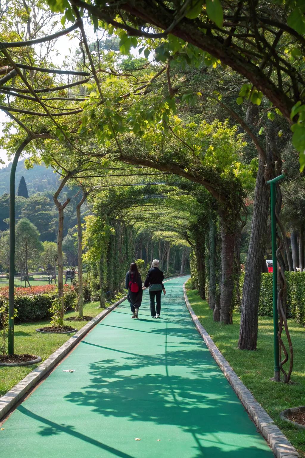 A serene green walkway in the city.