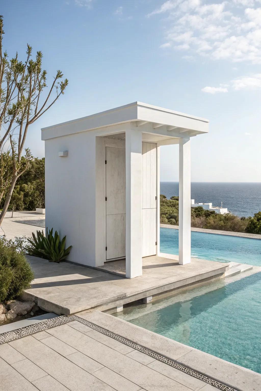A minimalist pool outhouse with clean lines creates a seamless look.