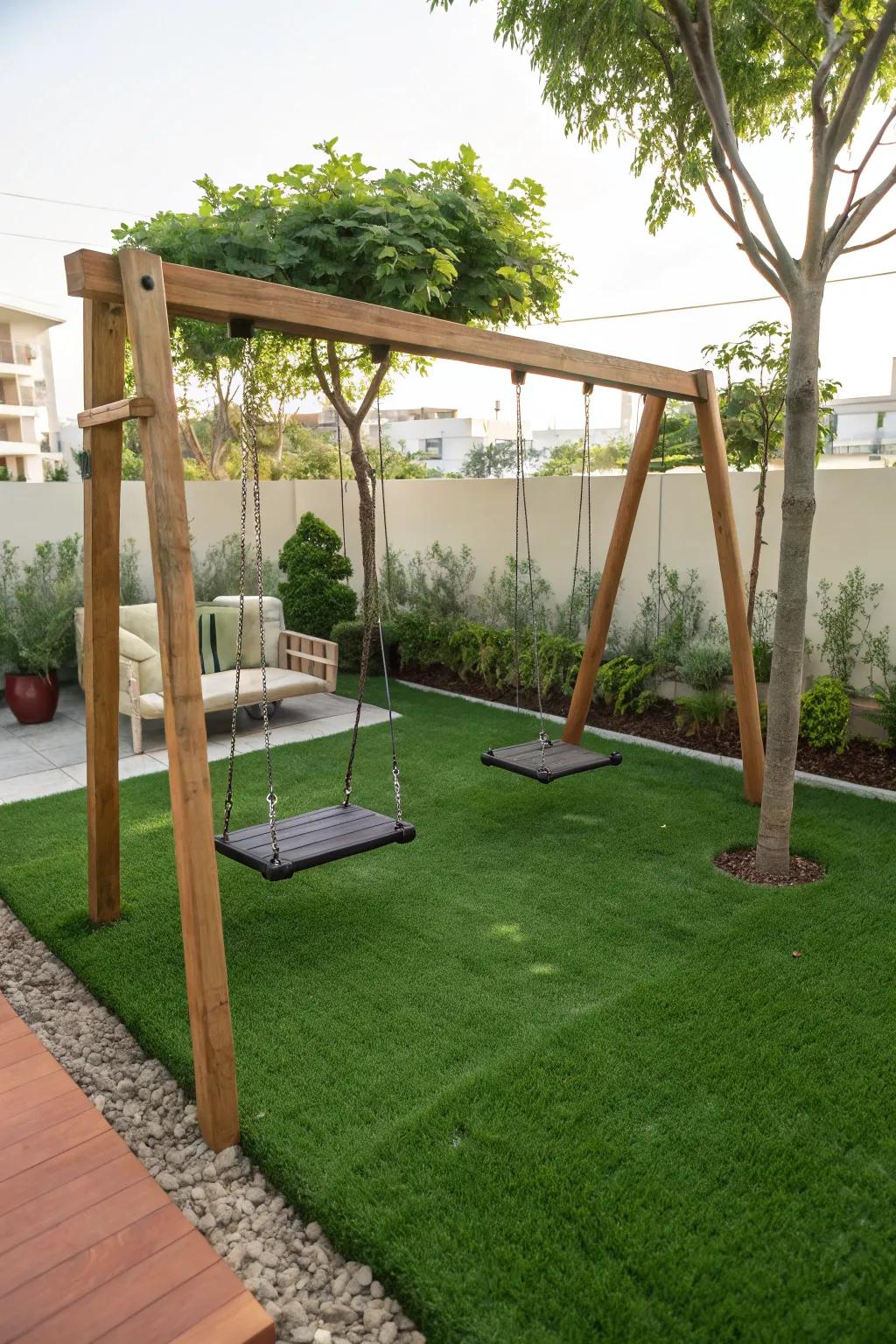 Swing set placed on a lush artificial turf area.