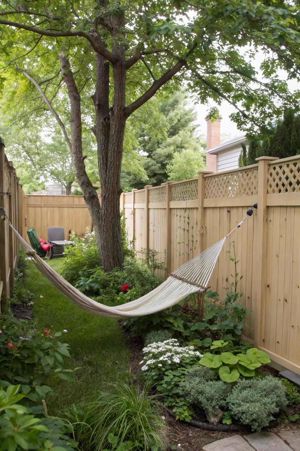 Tall privacy fences provide a peaceful and secluded backyard oasis.