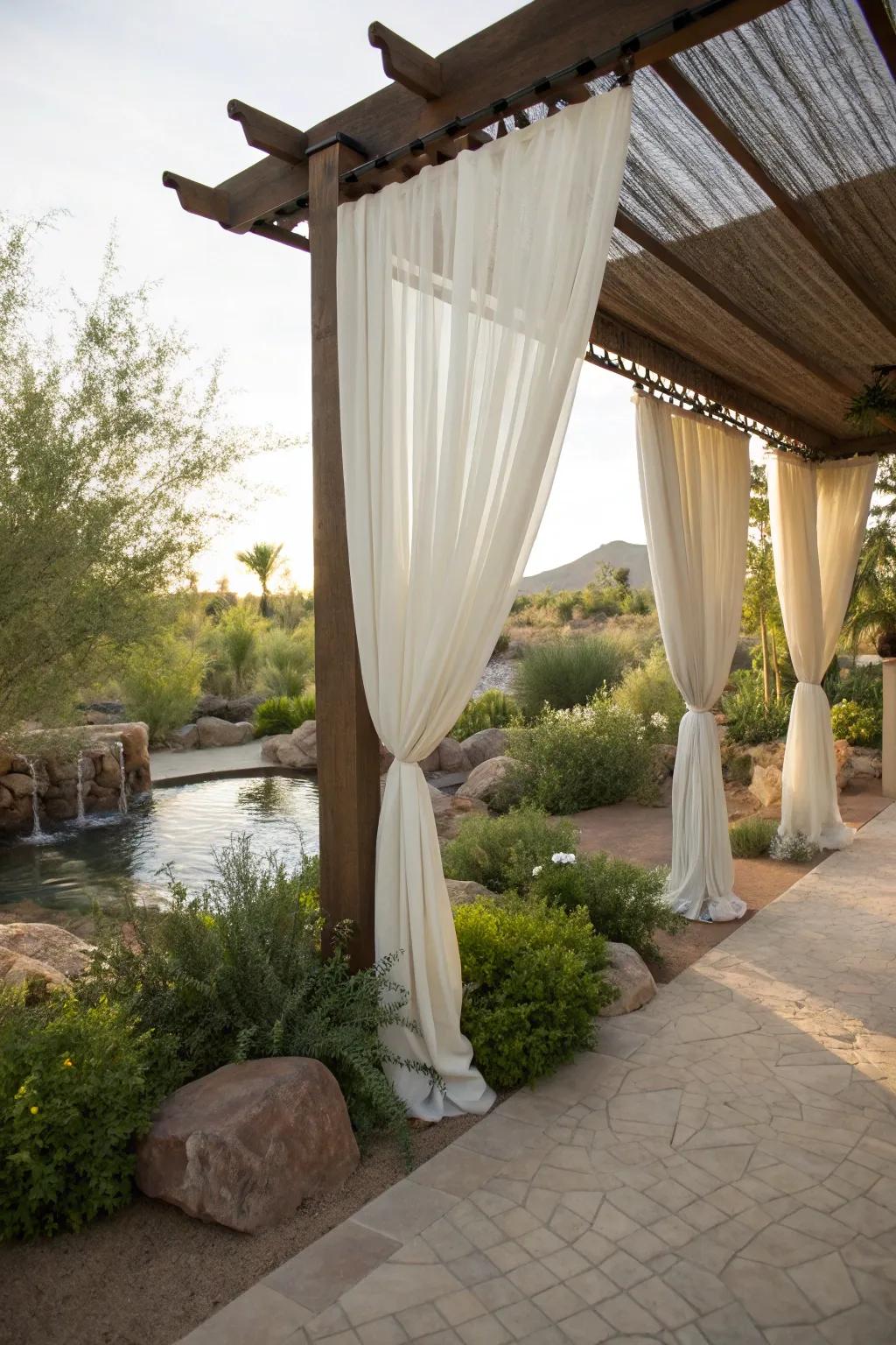 Outdoor curtains offer privacy and elegance.