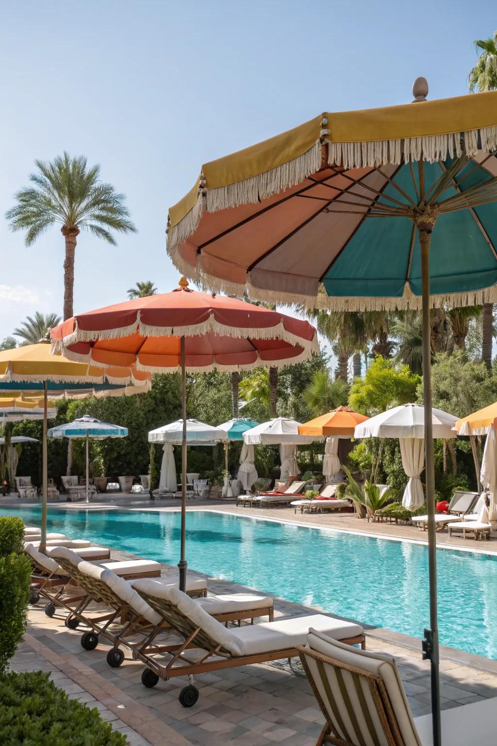 Multiple umbrellas offering generous shade for poolside gatherings.