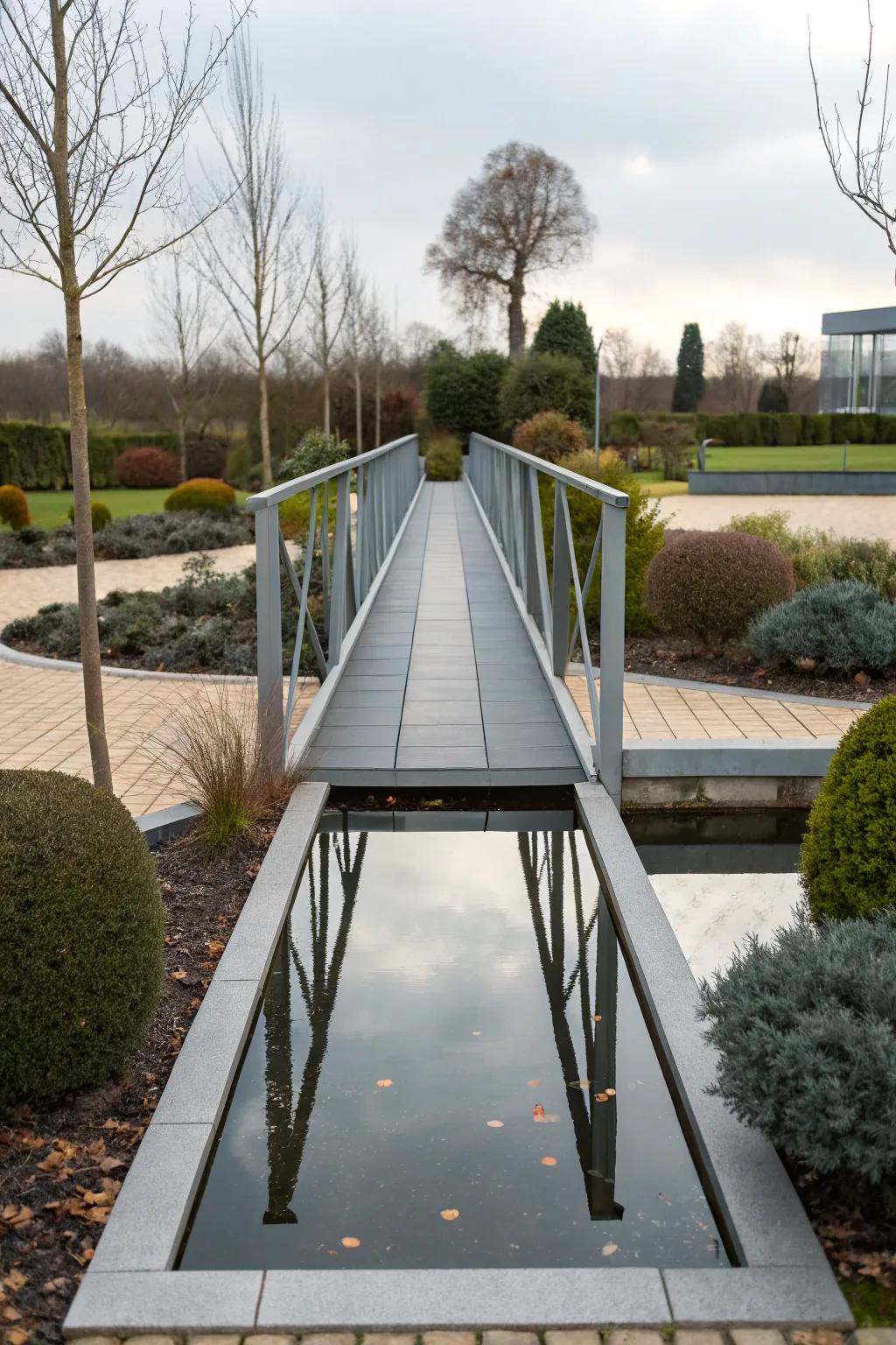 A minimalist metal bridge complements a modern garden design.