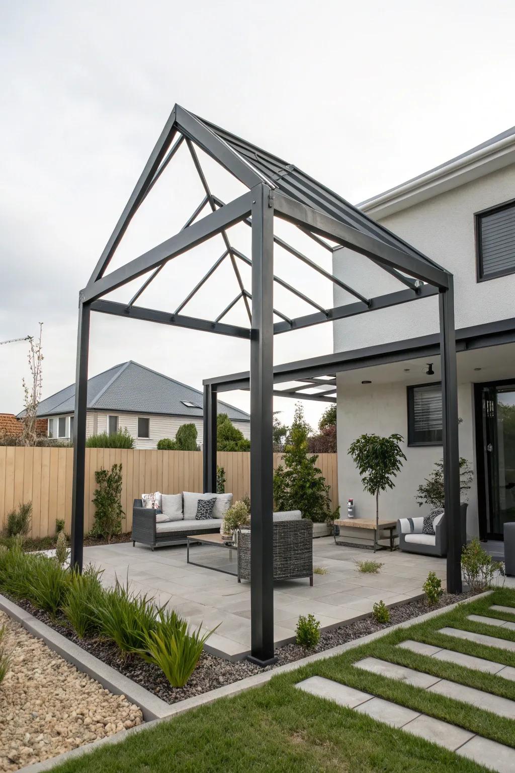 Sleek metal triangle pergola adding a contemporary flair to the garden.