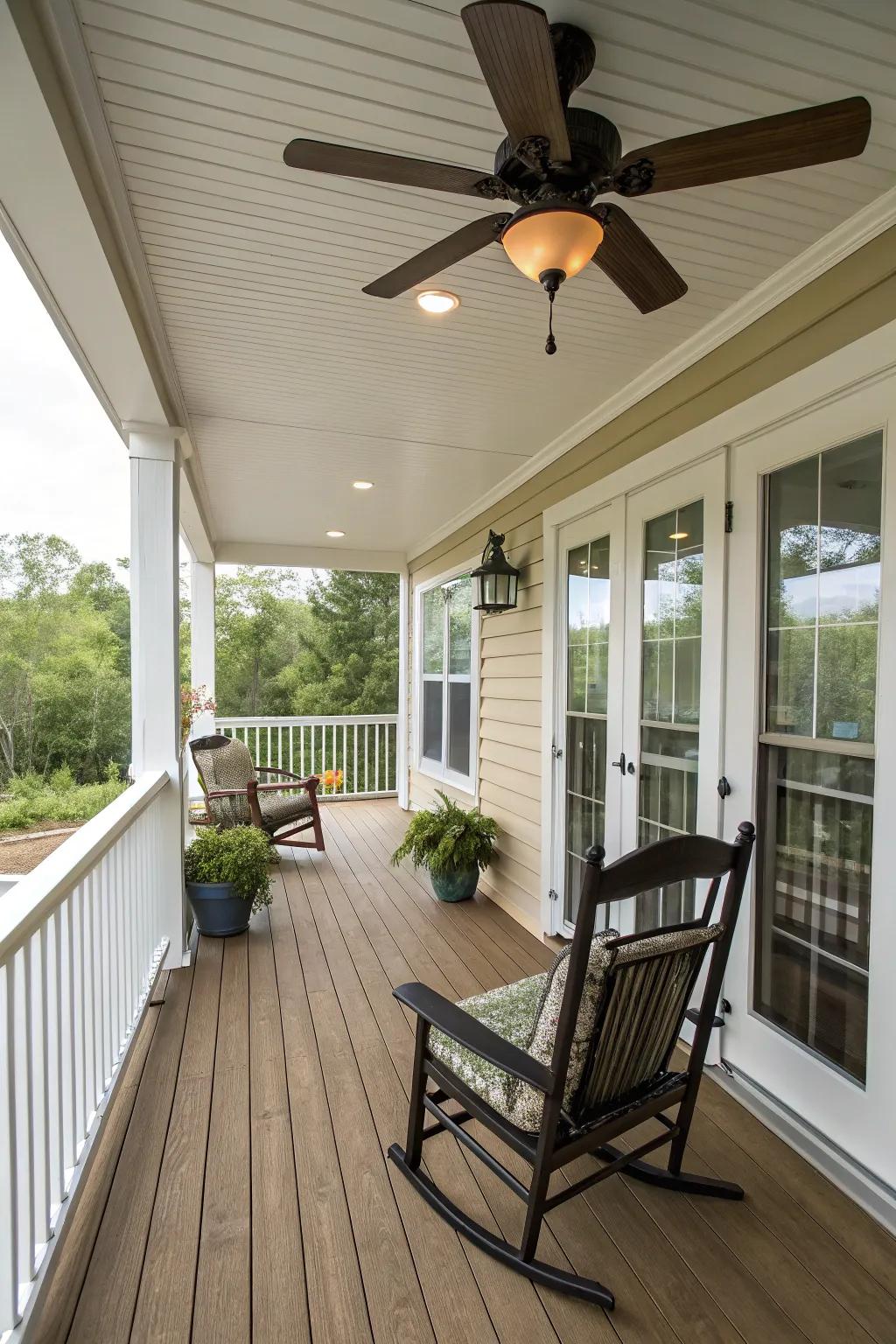A ceiling fan provides comfort on warm days on this porch.