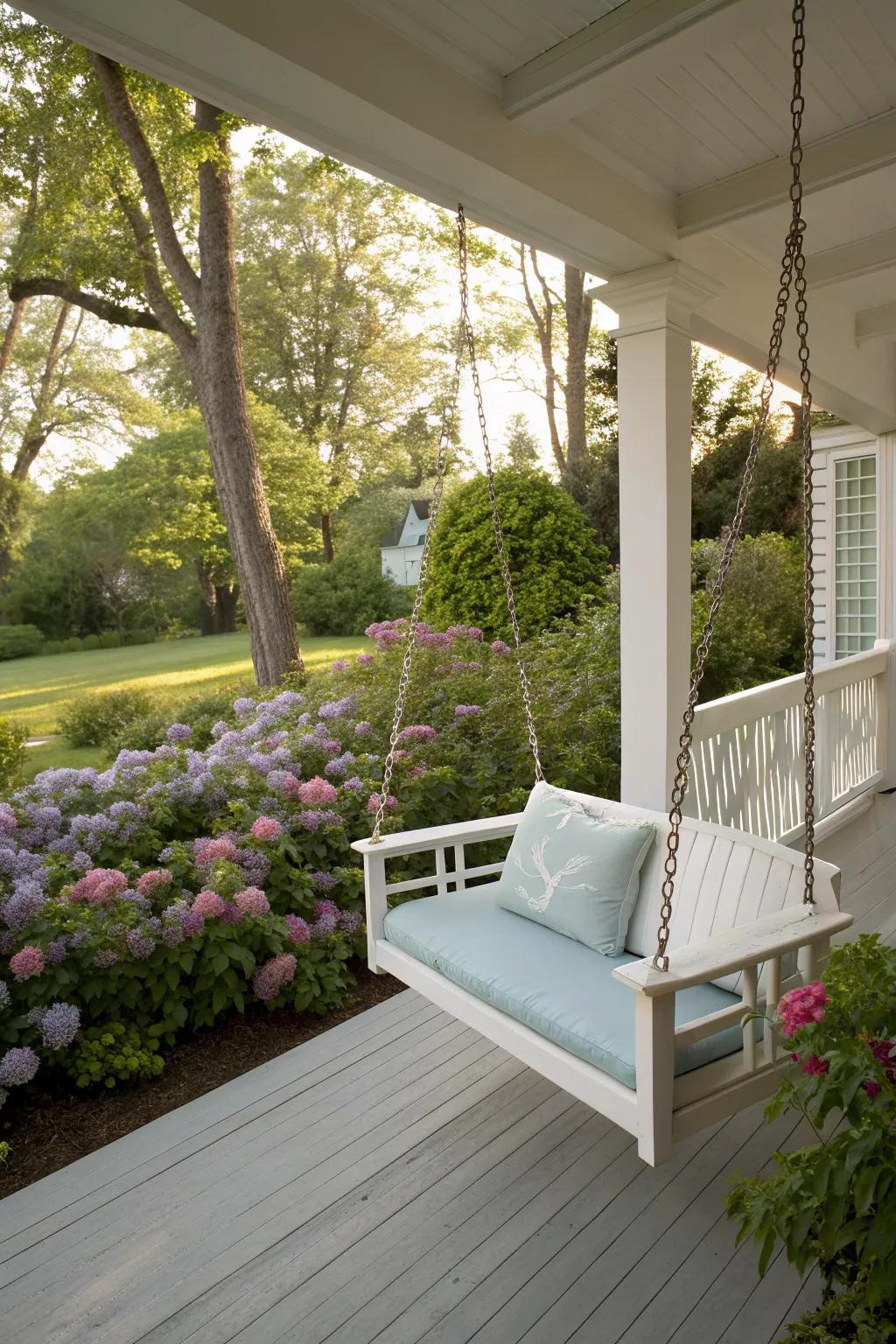 A swing or hammock adds a playful touch to this back porch.