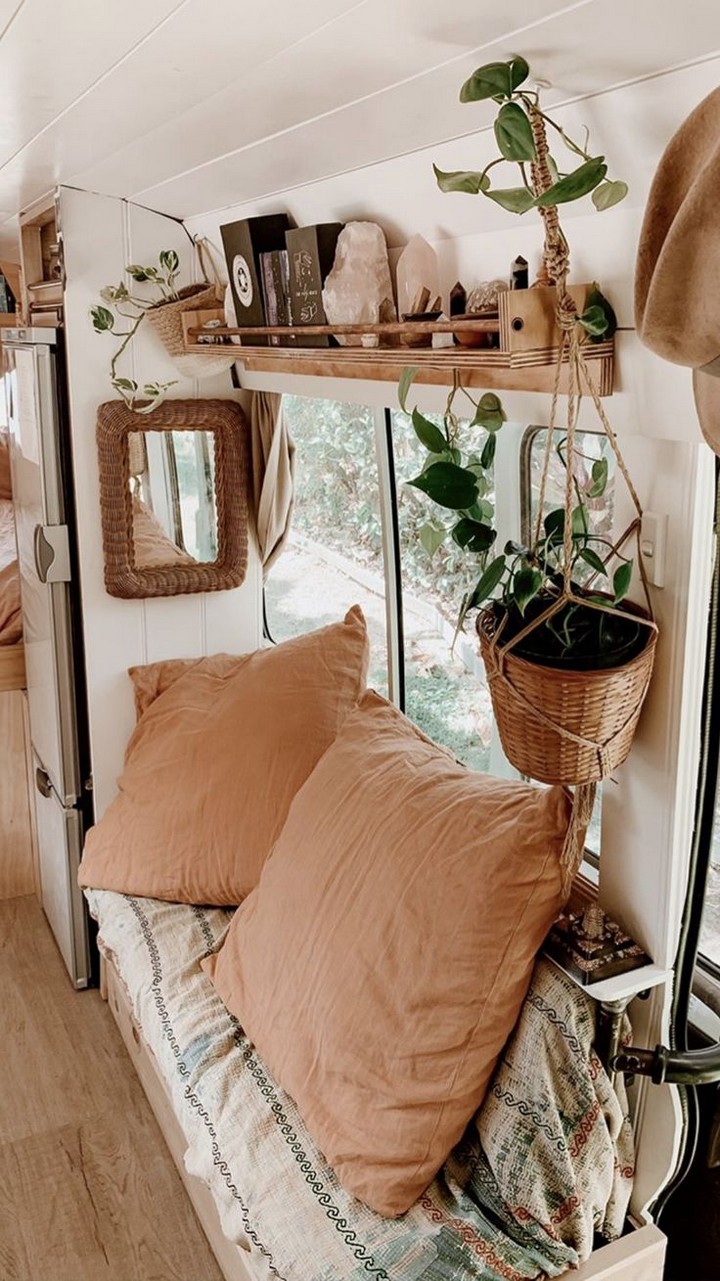 Rustic Airstream interior with reclaimed wood walls